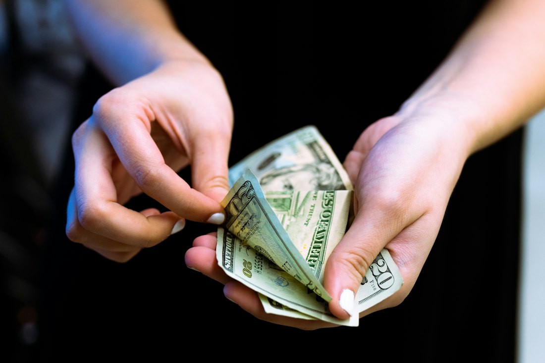 Counting cash in hand